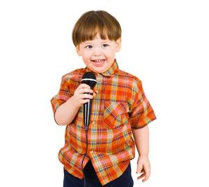 4634809 - kid singing, with black microphone on white background